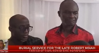 Kennedy Agyapong (R) looking at the mortal remains of his father