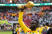 Senegal’s Krépin Diatta celebrates with the AFCON trophy