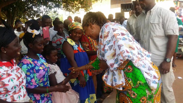 First Lady, Mrs. Lordina Mahama interacts with residents of Tuobodom.