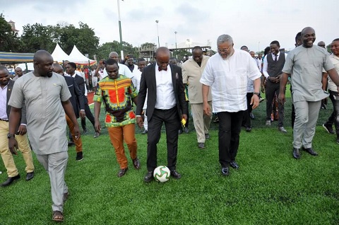 Robert Coleman with former President Rawlings at the unveiling of the Accra Aca turf