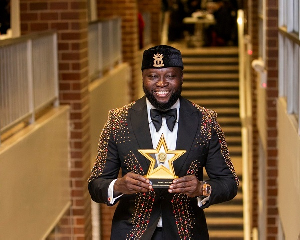 Danny Angels, CEO of Royal Kingdom Estate, with his award