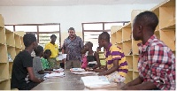 USAID/Ghana Mission Director Andrew Karas speaking with survivors of child trafficking in Ho