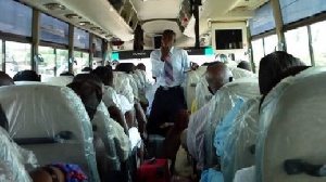 File photo: A Pastor preach in public transport.