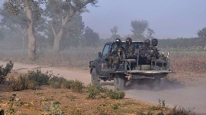 Members of the Cameroonian Rapid Intervention Force patrol Mosogo