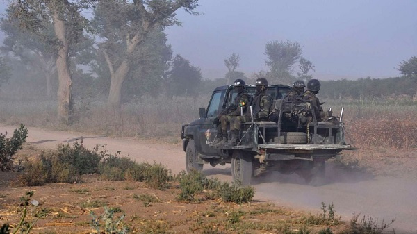 Members of the Cameroonian Rapid Intervention Force patrol Mosogo