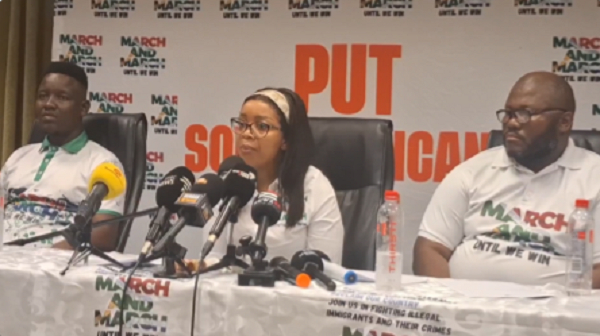 Jancita Ngobese-Zuma (M), the leader of the March-and-March speaking at the presser