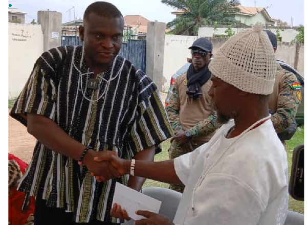 Bernard Nii Martei Korley in a handshake with one of the chiefs