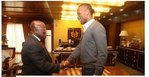 President Akufo-Addo in a handshake with the Ivory Coast star, Didier Drogba