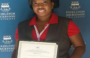 Vida Ofei-Addo displaying her certificate