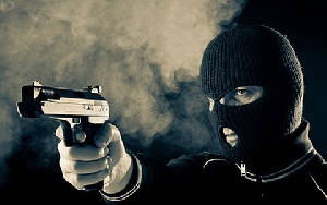 The unknown masked men wielding guns shot the three victims to death