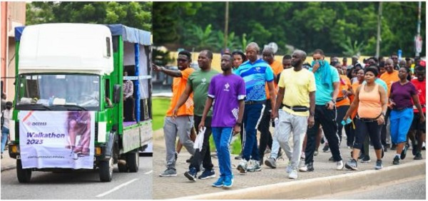 Staff of Access Bank walk the streets of Accra