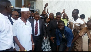 Hassan Ayariga with others leaving the court premises