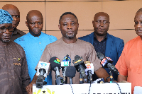 Minister of Health, Kwabena Mintah Akandoh behind the microphone