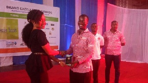 Mr Bennet Ashie (R) receiving the award from Ms Ewurabena Bilson, an Executive of Delta Capital