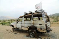 The abandoned wreckage of a vehicle used by the Spanish branch of MSF on the road to Sheweate Hugum