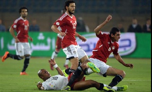 Is this picture depicting Egypt's position on Ghana? Dede is down fighting for the ball...