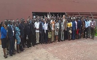 Stakeholders in a group photograph after a training workshop on marine insurance delivery in Ada