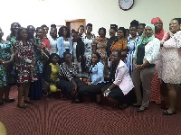 Women's Commission of GIMPA in a group picture with some of the female MP's
