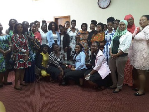 Women's Commission of GIMPA in a group picture with some of the female MP's