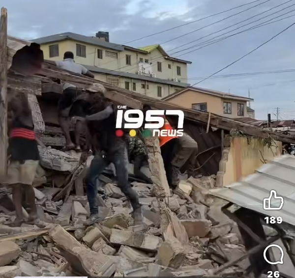 Some rescuers are seen trying to rescue those believed to have been trapped under the rubble