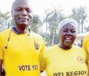 Kofi Adams with a lady campaigning for the creation of Oti Region while his party NDC is against it