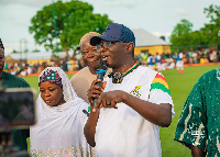 Dr. Mohammed Amin Adam (holding the microphone) is the Member of Parliament for Karaga