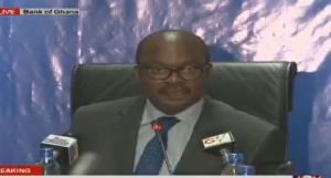 BoG Governor announcing the takeover at a press conference