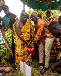Osagyefo Amoatia Ofori Panin and Lands Minister, Samuel A. Jinapor planting a tree