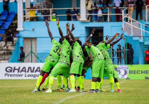 Bechem United squad in a photograph after a football match