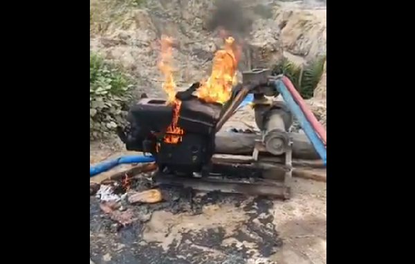 One of the mining equipment burnt by the soldiers