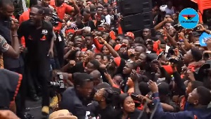 A section of the crowd at Ebony's one week memorial danced to Songo's performance