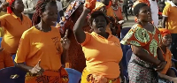 Opposition supporters cheer on the candidates during an election rally in Lomé