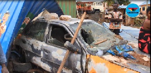 The flood dragged a taxi parked nearby to crash the shop destroying goods in it