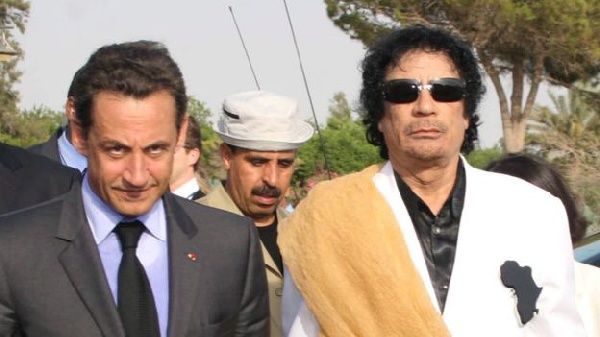 File photo of Gaddafi and ex French president Nicolas Sarkozy