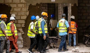 File photo of officials at the site