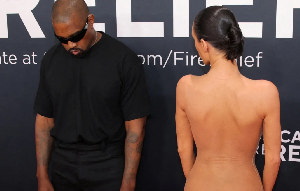 Kanye West's casual black T-shirt and trousers stood in stark contrast to Censori's nudity