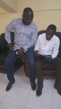 Medeama president Moses Armahn with an official of Medeam SC