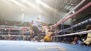 Isaac Sackey on the ground after receiving Wasiru Mohammed's heavy punch