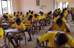 Students writing exams