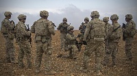 Some personnel of the US military on a field