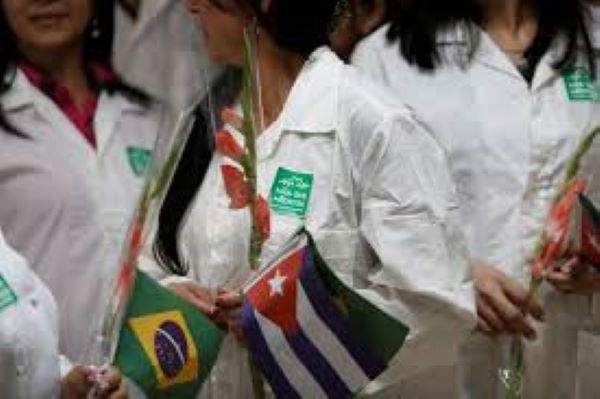 Cuban doctors wore the stickers at a welcoming ceremony
