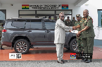 Some of the beneficiaries receiving the new vehicle