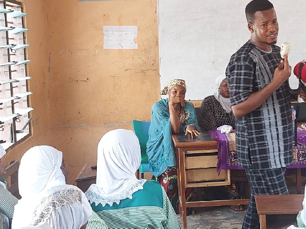 Umaru Sanda Amadu interacting with the girls