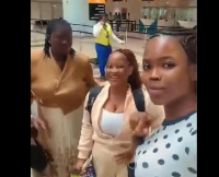 Mercy Yaaba Bredu (M) with her family at the Accra International Airport