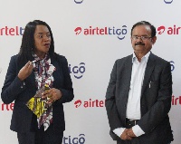 CEO of AirtelTigo, Mitwa Kaemba Ng'ambi with Group CEO of iSON BPO, Pravin Kumar