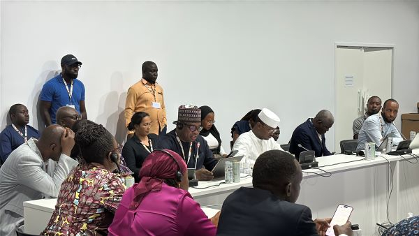 Issifu Seidu (blue-black kaftan) is the Minister of State for Climate Change and Sustainability