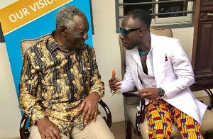 Former President John Agyekum Kufuor (L) in a shot with Okyeame Kwame
