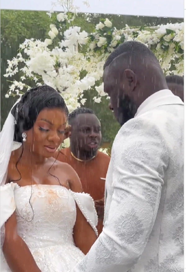 The couple who had their wedding in the rain