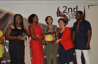 Mrs. Antwi (left) receiving her citation from the Turkish Ambassador to Ghana