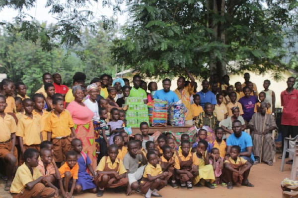 Hope Restoration Network members with the people of Otsirikomfo community